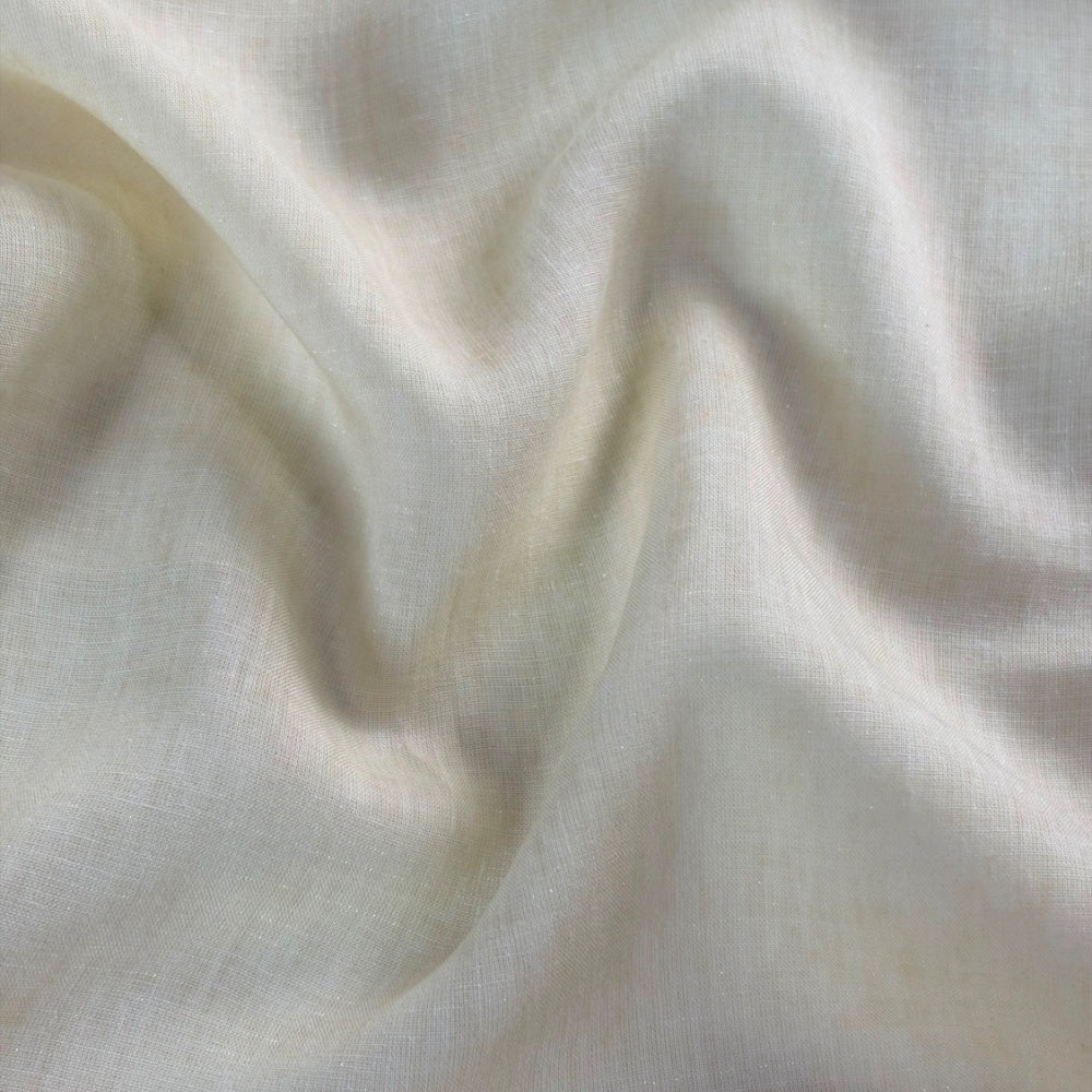 Close-up of pale ivory cloth with a fine visible grid weave, draped in broad curved folds with muted beige shadows.
